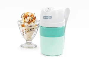 Mint green DASH ice cream maker with sundae dessert