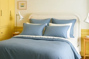 Cozy bedroom with blue bedding